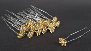 Шпильки для волос купить оптом по низкой цене с быстрой доставкой. Шпильки-ромашки для волос со стразами хорошего качества отлично держатся в прическе