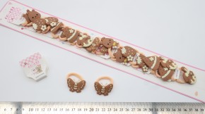 Резинки для волос  купить оптом по низкой цене с доставкой по России и СНГ. Модные банты для девочек бант на резинке для танцев купить оптом. Бантик с украшением на резинке купить оптом