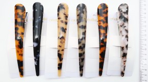 Зажимы для волос с леопардом оптом. Уточки для волос украсят любую причёску. Быстрый сбор и доставка по всей России.