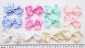 Бантики для волос на зажиме оптом, большой выбор.